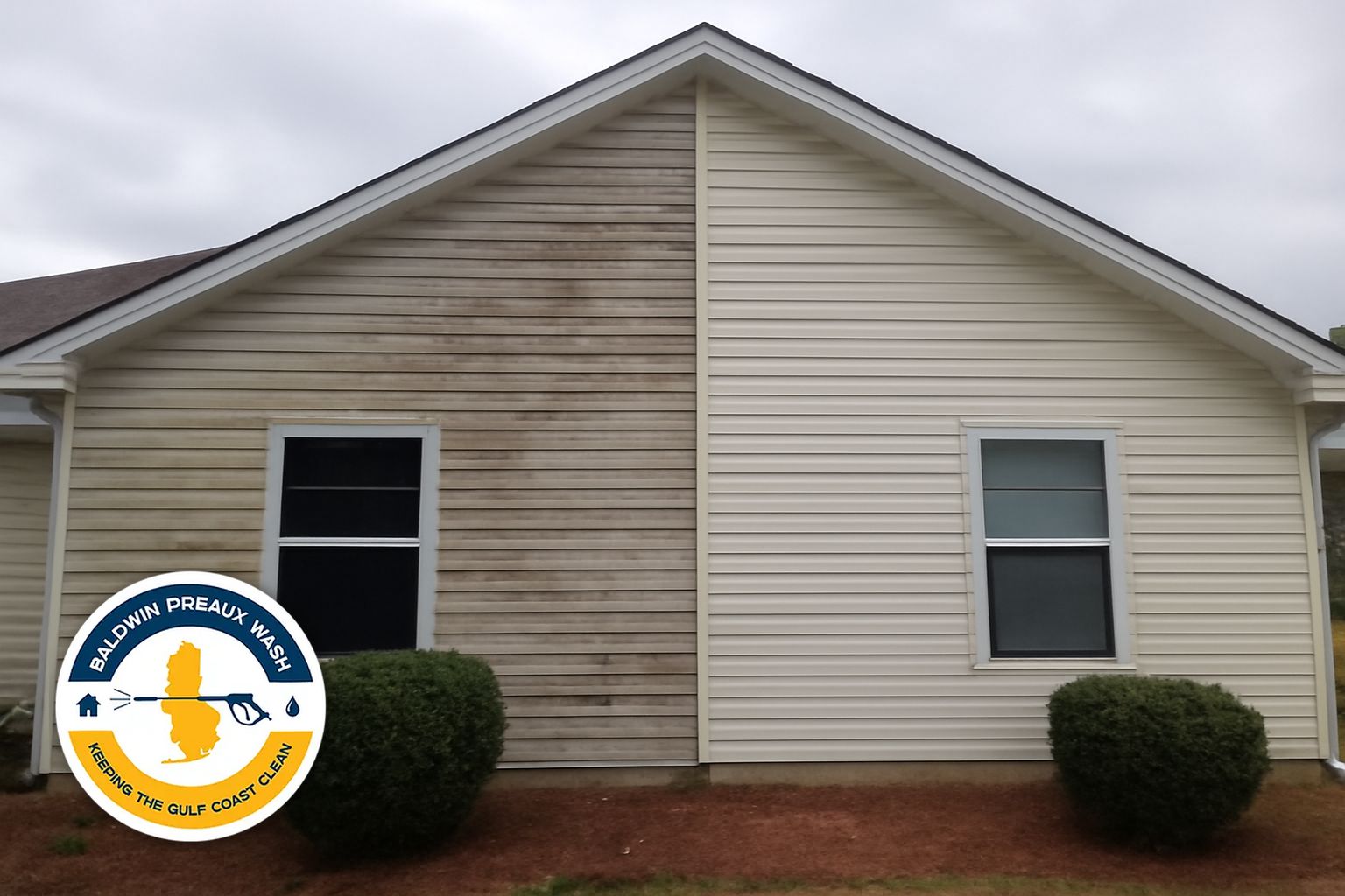 Soft washing the exterior siding of a Gulf Coast home in Orange Beach Alabama